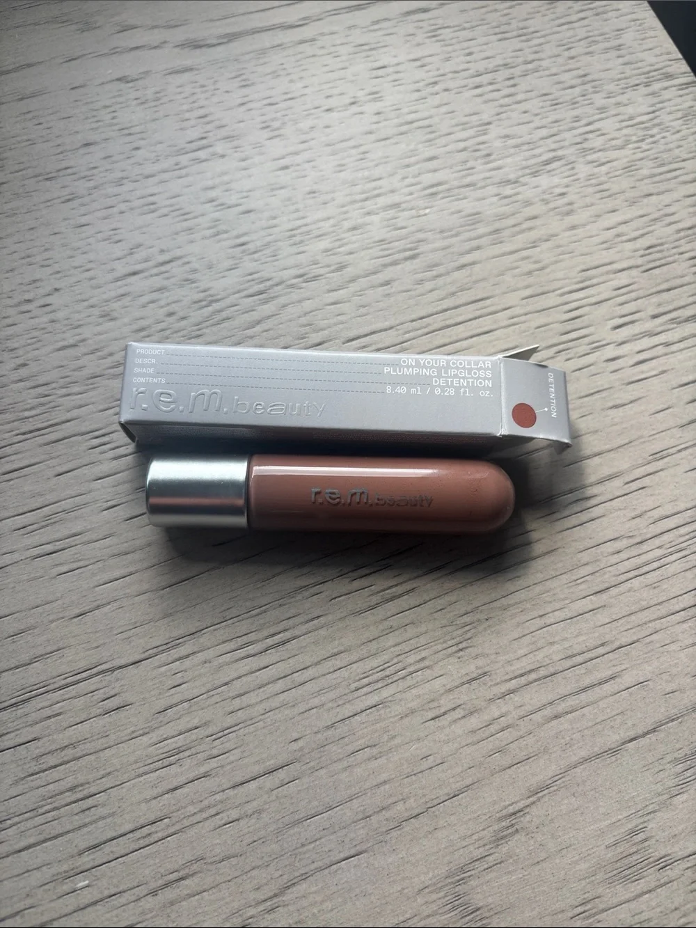 REM Beauty On Your Collar Plumping Lipgloss — Nude Brown Detention